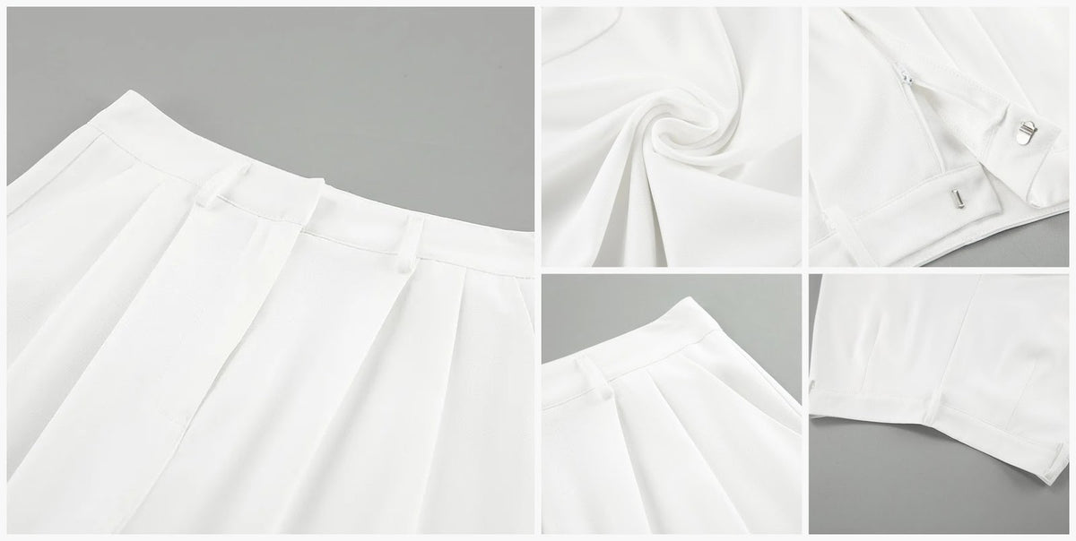 Detalle del dobladillo, costuras y acabado de Pantalón de vestir estilo palazzo de tiro alto con pinzas frontales pronunciadas, trabillas para cinturón, cierre oculto de cremallera con broche metálico y pernera ancha recta con caída fluida en tejido de poliéster