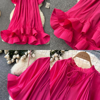 Detalle del dobladillo, costuras y acabado de Vestido midi holgado para mujer en colores liso negro, blanco, fucsia, verde esmeralda y rojo anaranjado, con escote redondo fruncido ajustable con lazo, mangas al codo acampanadas y falda fluida con doble volante en el bajo