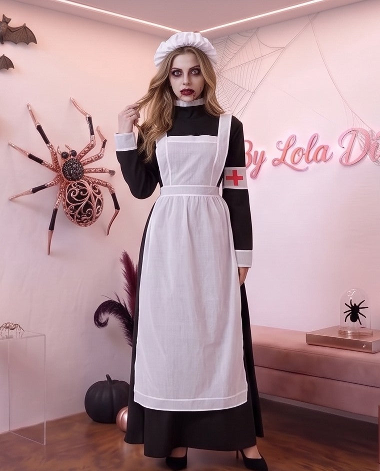 Disfraz vintage de enfermera de época victoriana o monja médica para mujer, compuesto por vestido largo negro de cuello alto y manga larga con puños blancos, delantal blanco con tirantes cruzados a la espalda, brazalete blanco con cruz roja y cofia blanca fruncida a juego