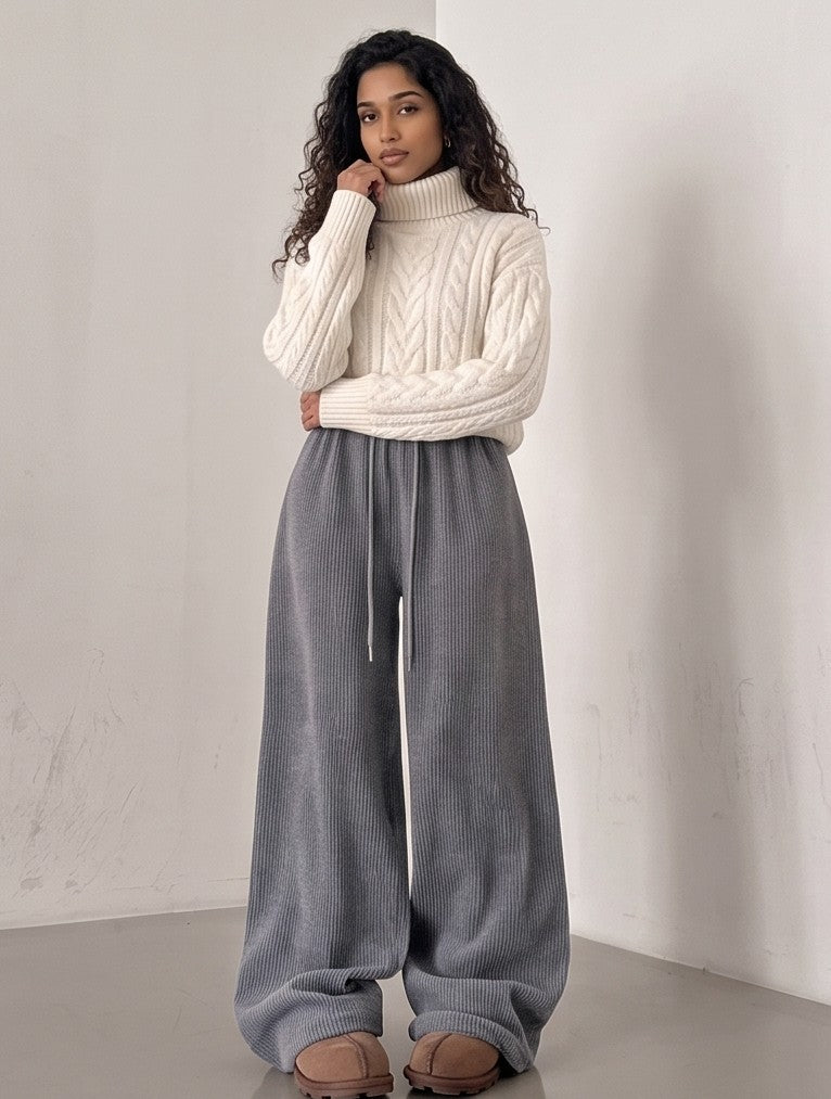 Pantalones de chándal cómodos y elegantes en terciopelo negro, gris y blanco. Pierna ancha y cordón ajustable para un ajuste perfecto