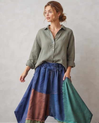 Pantalón bombacho holgado para mujer de estilo europeo con diseño de bloques de color estilo vaquero, mezcla de tonos azules, marrones y verdes, bolsillos amplios y corte relajado de pierna ancha.