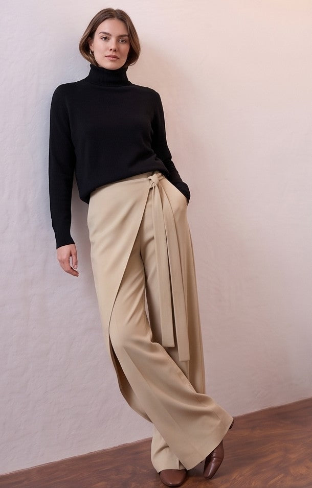 pantalones palazzo muy anchos para mujer, con un diseño wrap cruzado que crea un efecto falda superpuesto y una tira larga lateral que se anuda en la cintura. Disponibles en una variedad de siete colores vibrantes