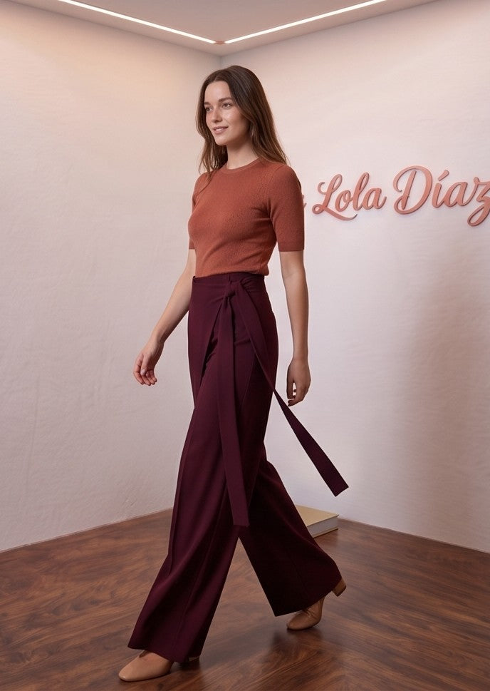 pantalones palazzo muy anchos para mujer, con un diseño wrap cruzado que crea un efecto falda superpuesto y una tira larga lateral que se anuda en la cintura. Disponibles en una variedad de siete colores vibrantes